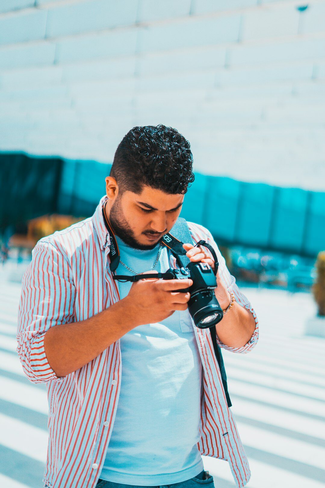 young man taking photos